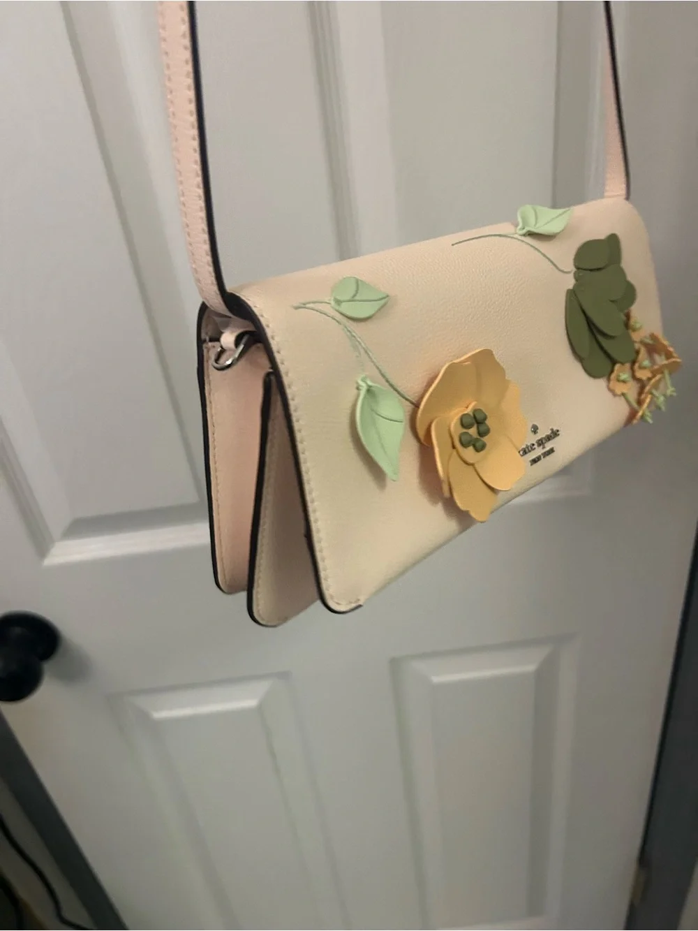 NWOT KATE SPADE floral appliqué leather crossbody bag.